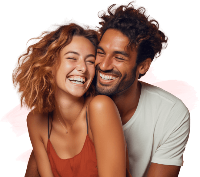 Man and woman laughing while hugging