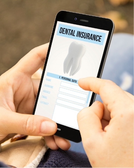 Person looking at dental insurance information on their phone