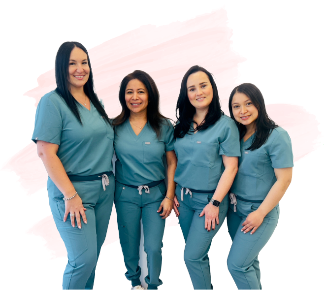 Four smiling dental team members at Amityville Orthodontics