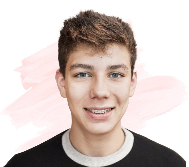 Smiling teenage boy with traditional braces