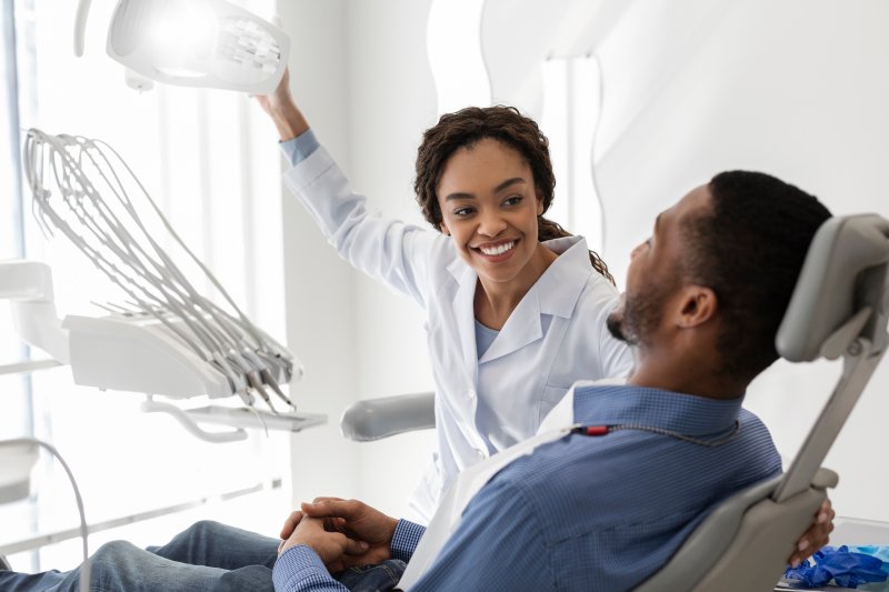 Patient talking to orthodontist at their orthodontics consultation